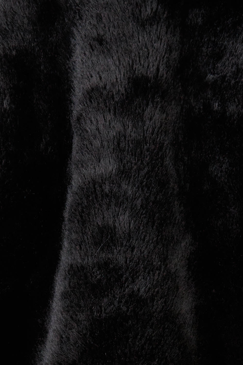 Product shot of the Unreal Core Vest in colour Black (Black), detail