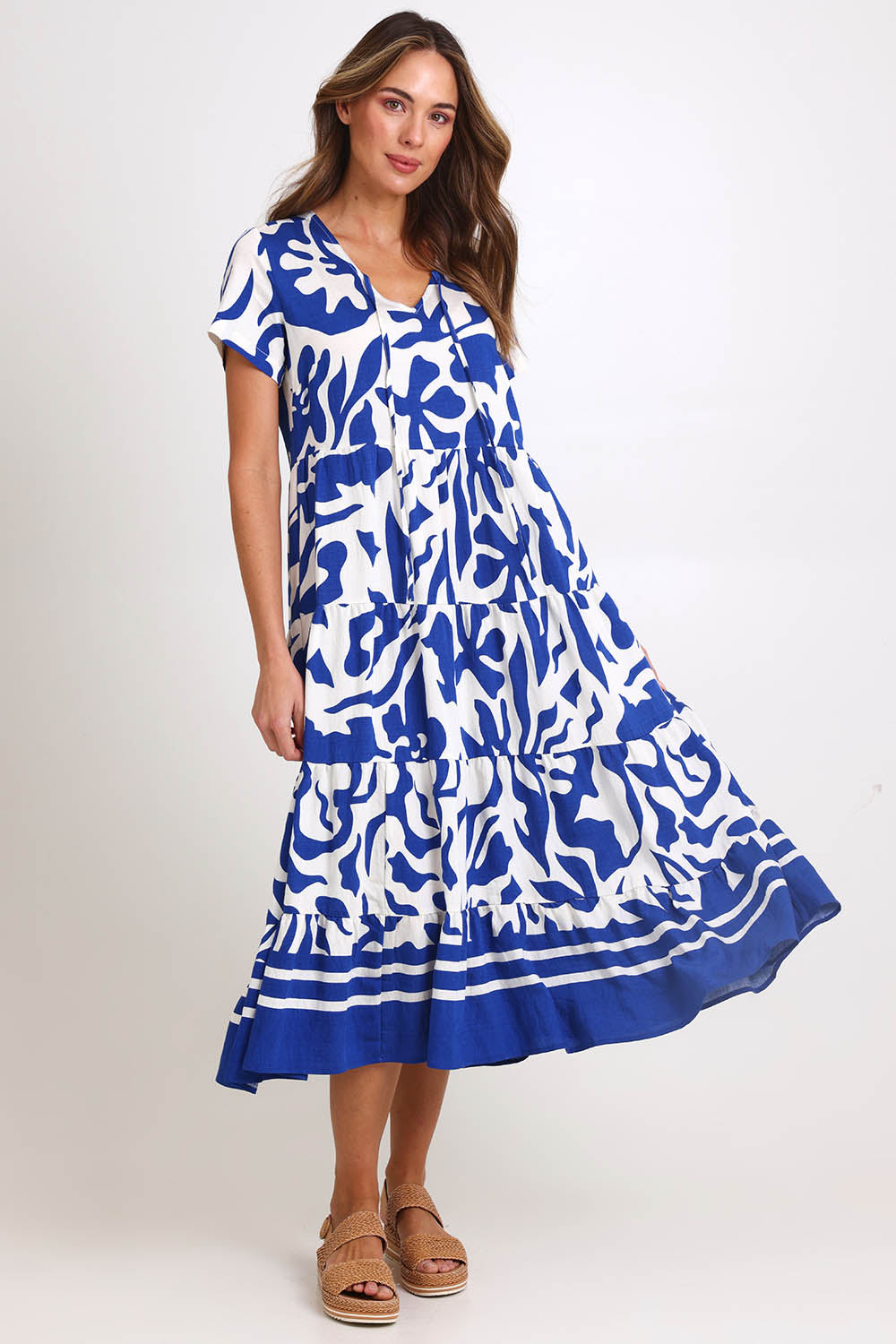 Model Madelinec wearing size 10 of the Tier Garden Dress – Blue in colour Blue, from the front