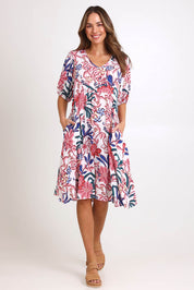Model Madelinec wearing size 10 of the Billow Pocket Print Dress – Pink in colour Pink, from the front