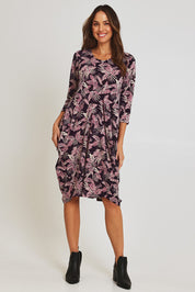 Model Madeline wearing size 10 of the Bounce Dress in colour Purple (Purple), from the front, showing the whole outfit