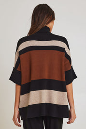 Model Madeline wearing size OneSize of the Stripe Polo Knit Pullover in colour Coffee, from the back