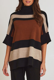 Model Madeline wearing size OneSize of the Stripe Polo Knit Pullover in colour Coffee, from the front, cropped image