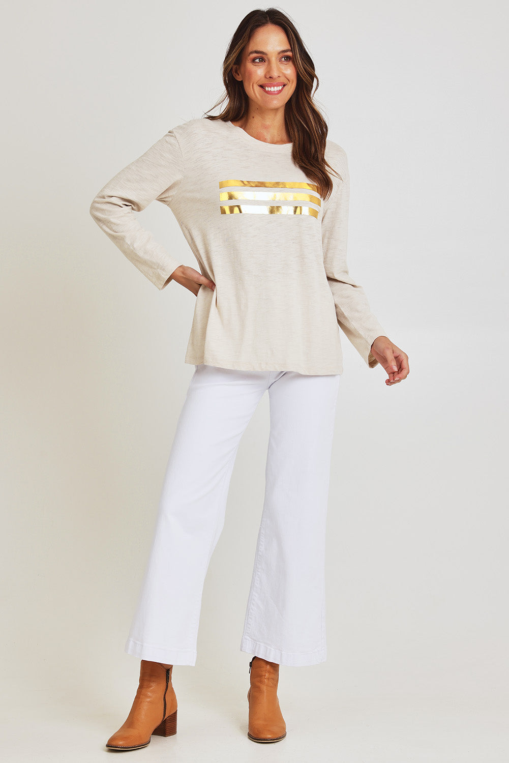 Model Madeline wearing size 10 of the Foiling Around Cotton Tee in colour Oatmeal, from the front, showing the whole outfit