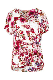 Product shot of the Perfect Vee Tee in colour Floral (Pink), from the front