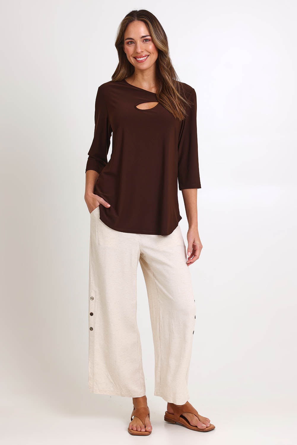 Model Madelinec wearing size 10 of the Ring Top – Choc in colour Choc, from the front