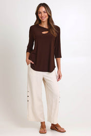 Model Madelinec wearing size 10 of the Ring Top – Choc in colour Choc, from the front