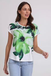 Model Madeline wearing size 10 of the Green Goddess Scoop Tee in colour Green (Green), from the front, cropped image