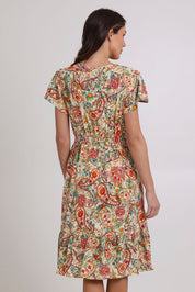 Model Madeline wearing size 10 of the Kiara Pocket Dress in colour Floral, from the back