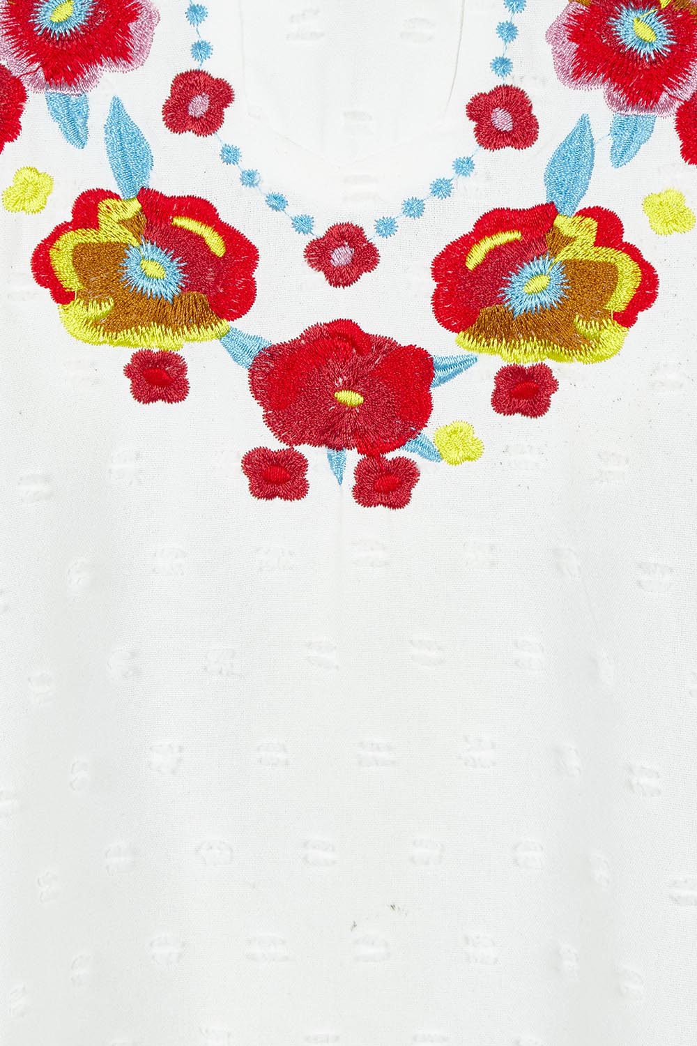 Product shot of the Embroidered Dobi Top in colour White (White), detail
