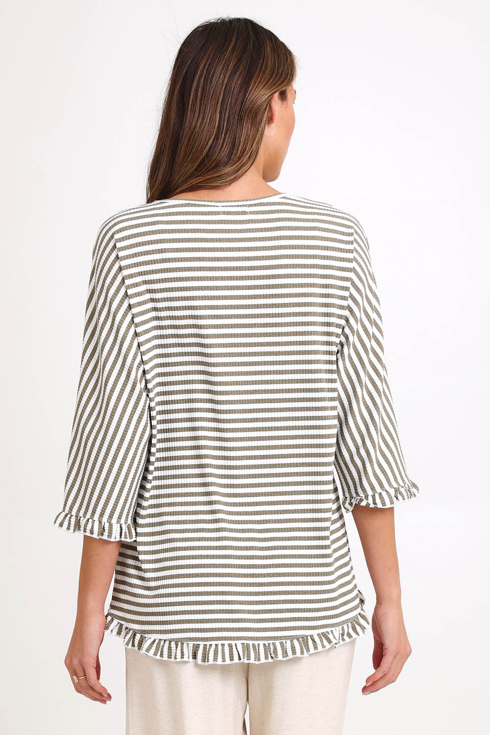Model Madelinec wearing size 10 of the Stripe Ruffle Top – Bark in colour Bark, from the back