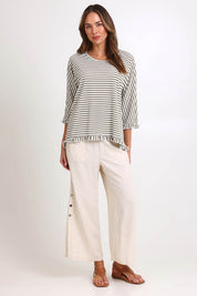 Model Madelinec wearing size 10 of the Stripe Ruffle Top – Bark in colour Bark, from the front
