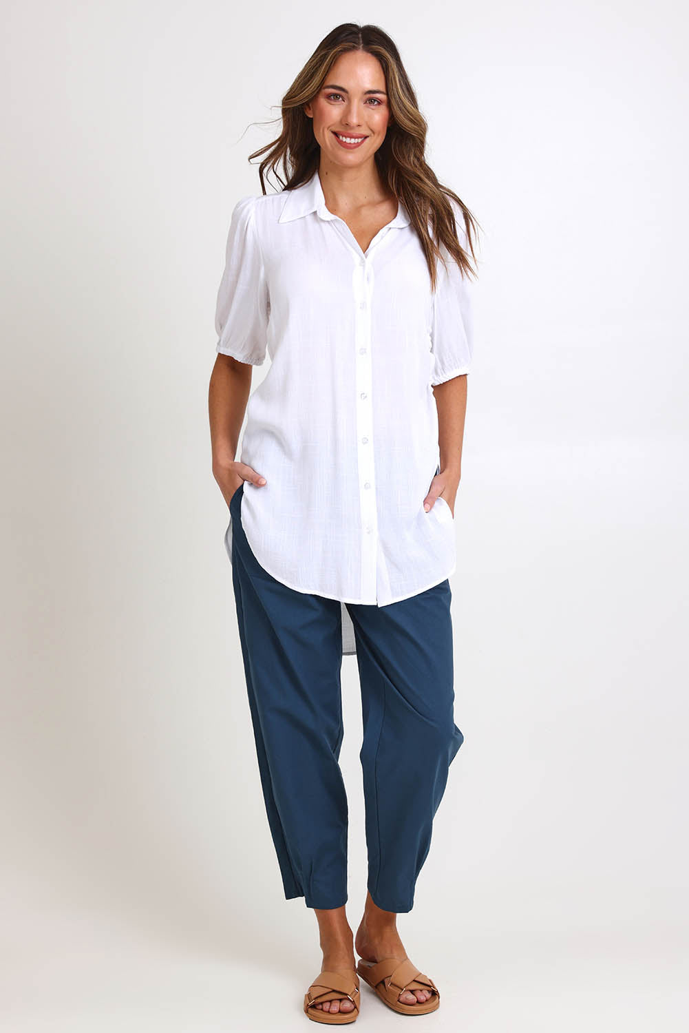 Model Madelinec wearing size 10 of the Drawstring Tunic Shirt – White in colour White, from the front
