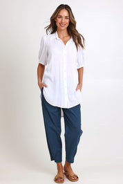 Model Madelinec wearing size 10 of the Drawstring Tunic Shirt – White in colour White, from the front