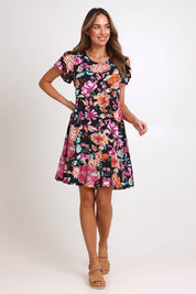 Model Madelinec wearing size 10 of the Heatwave Dress – Black in colour Black, from the front