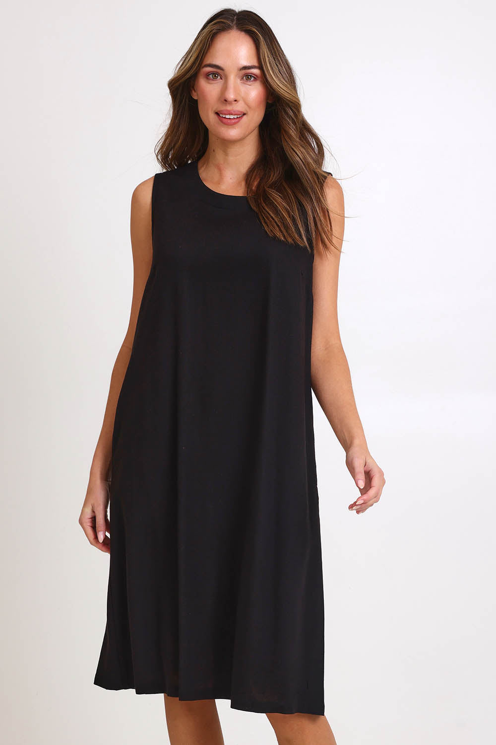 Model Madelinec wearing size 10 of the Linen Shift Dress – Black in colour Black, in a cropped view