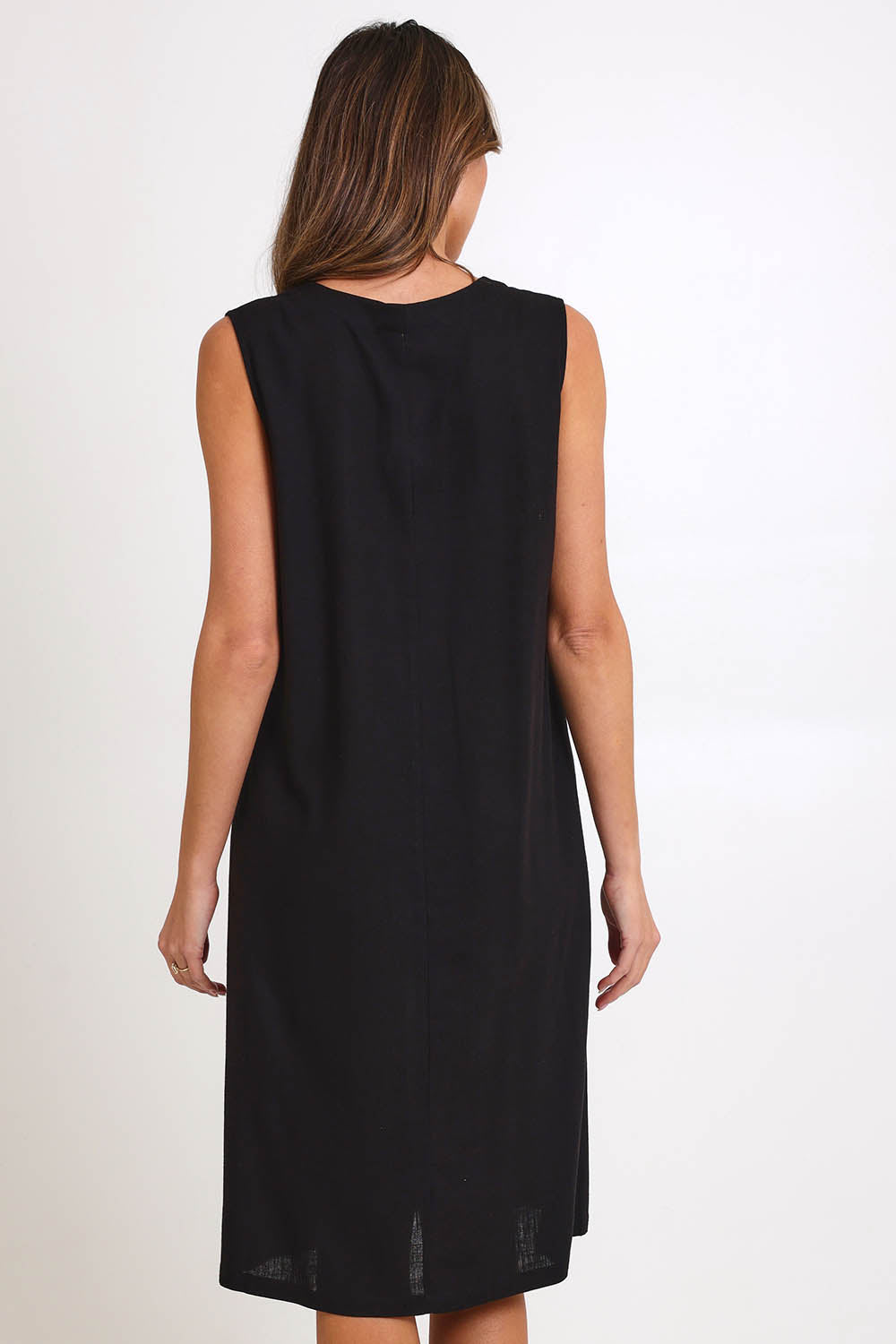Model Madelinec wearing size 10 of the Linen Shift Dress – Black in colour Black, from the front