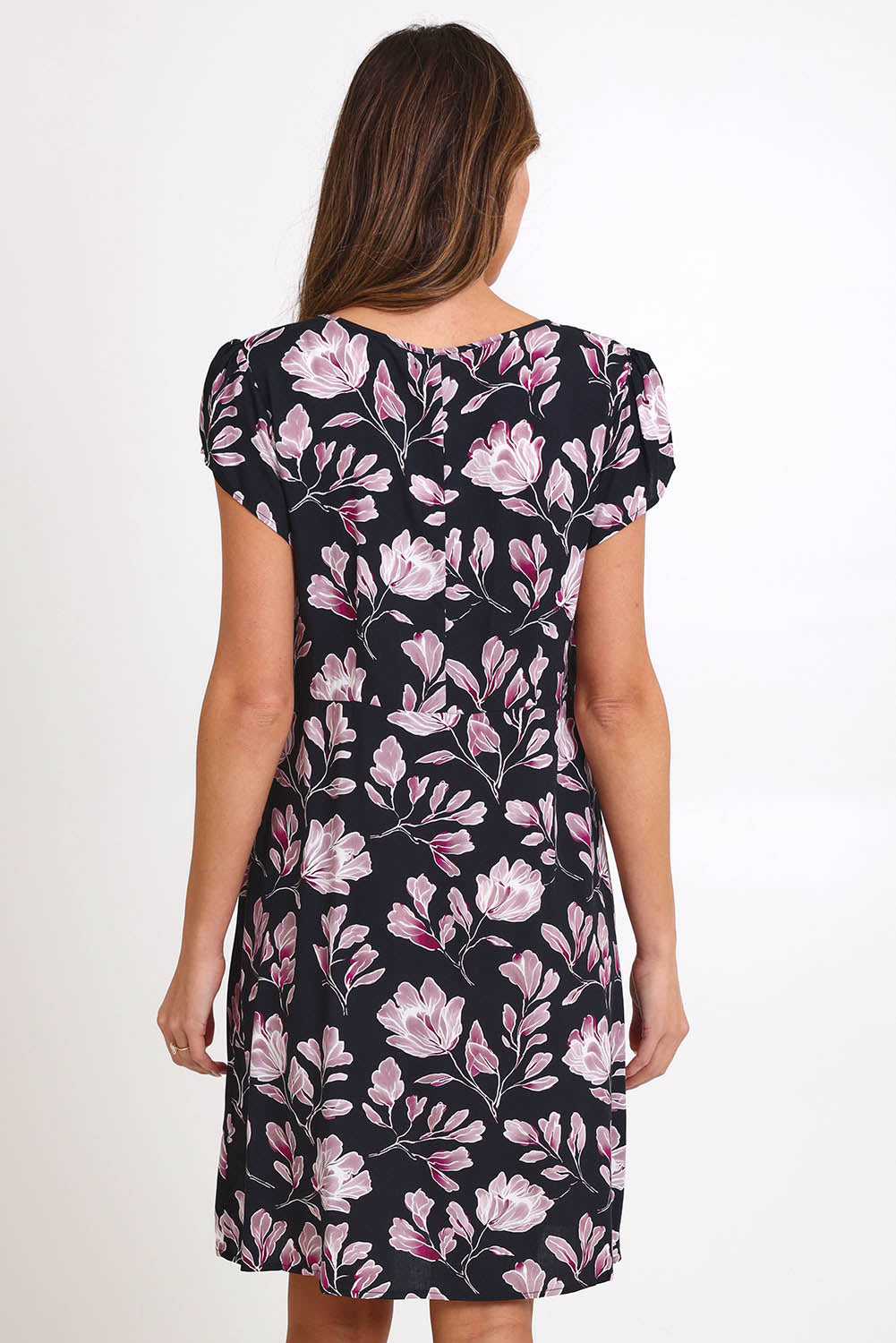 Model Madelinec wearing size 10 of the Kirra Pintuck Dress – Blkfloral in colour Blkfloral, from the back