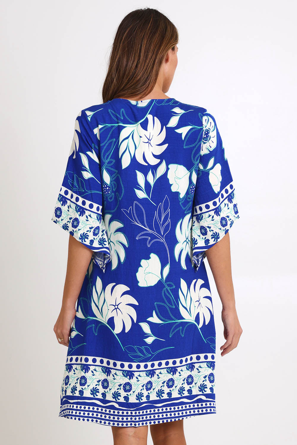 Model Madelinec wearing size 10 of the Sun Dress – Royal in colour Royal, from the back