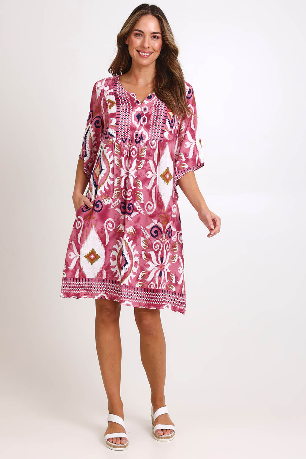 Model Madelinec wearing size 10 of the Sun Dress – Rose in colour Rose, from the front