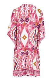 Product shot of the Sun Dress – Rose in colour Rose, from the back