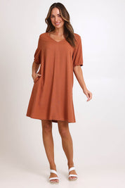 Model Madelinec wearing size 10 of the Core Linen V Shift Dress – Cinnamon in colour Cinnamon, from the front
