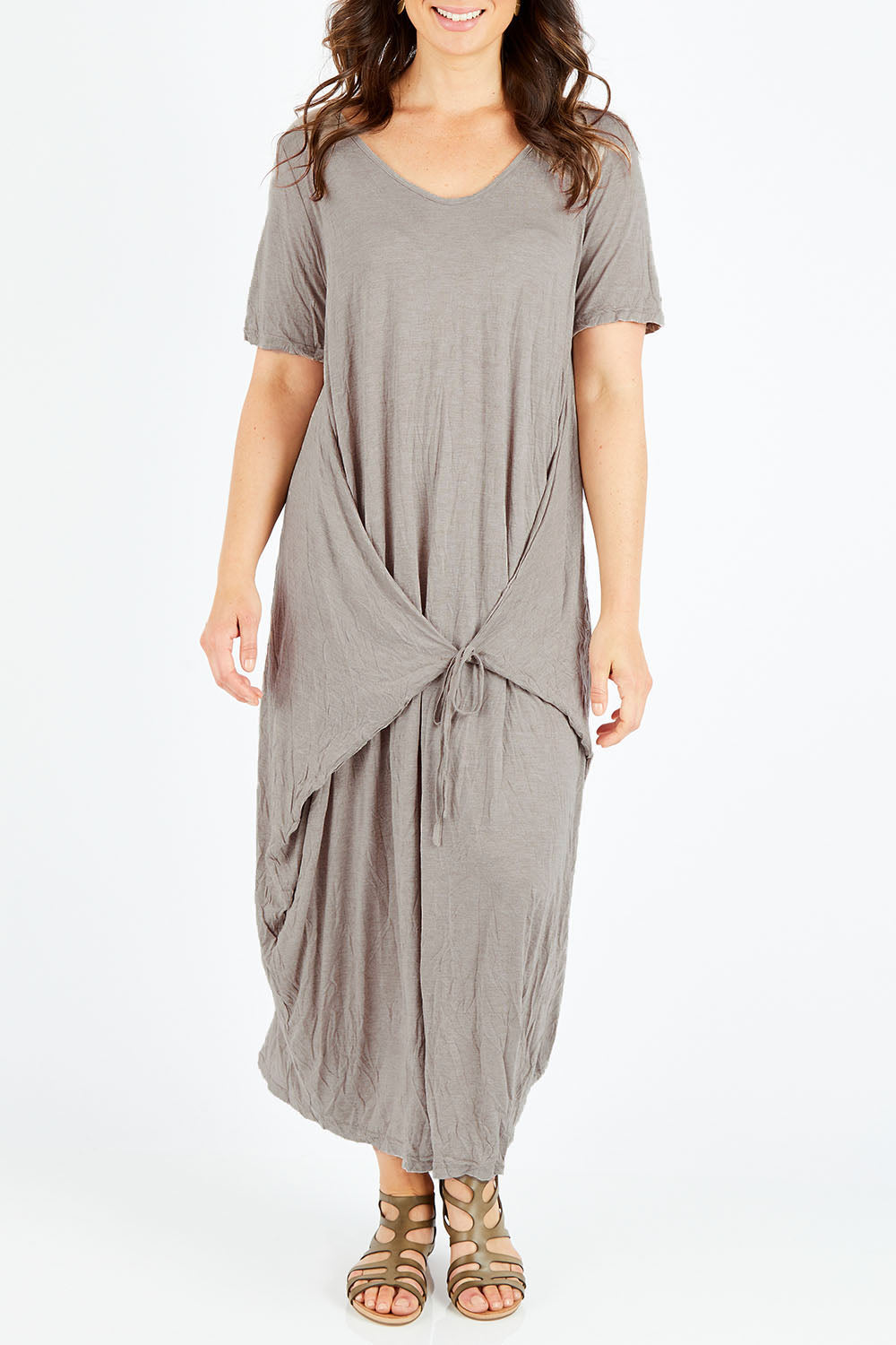 Model Shadae wearing size S-M of the Primrose Dress in colour Oatmeal, from the front, cropped image