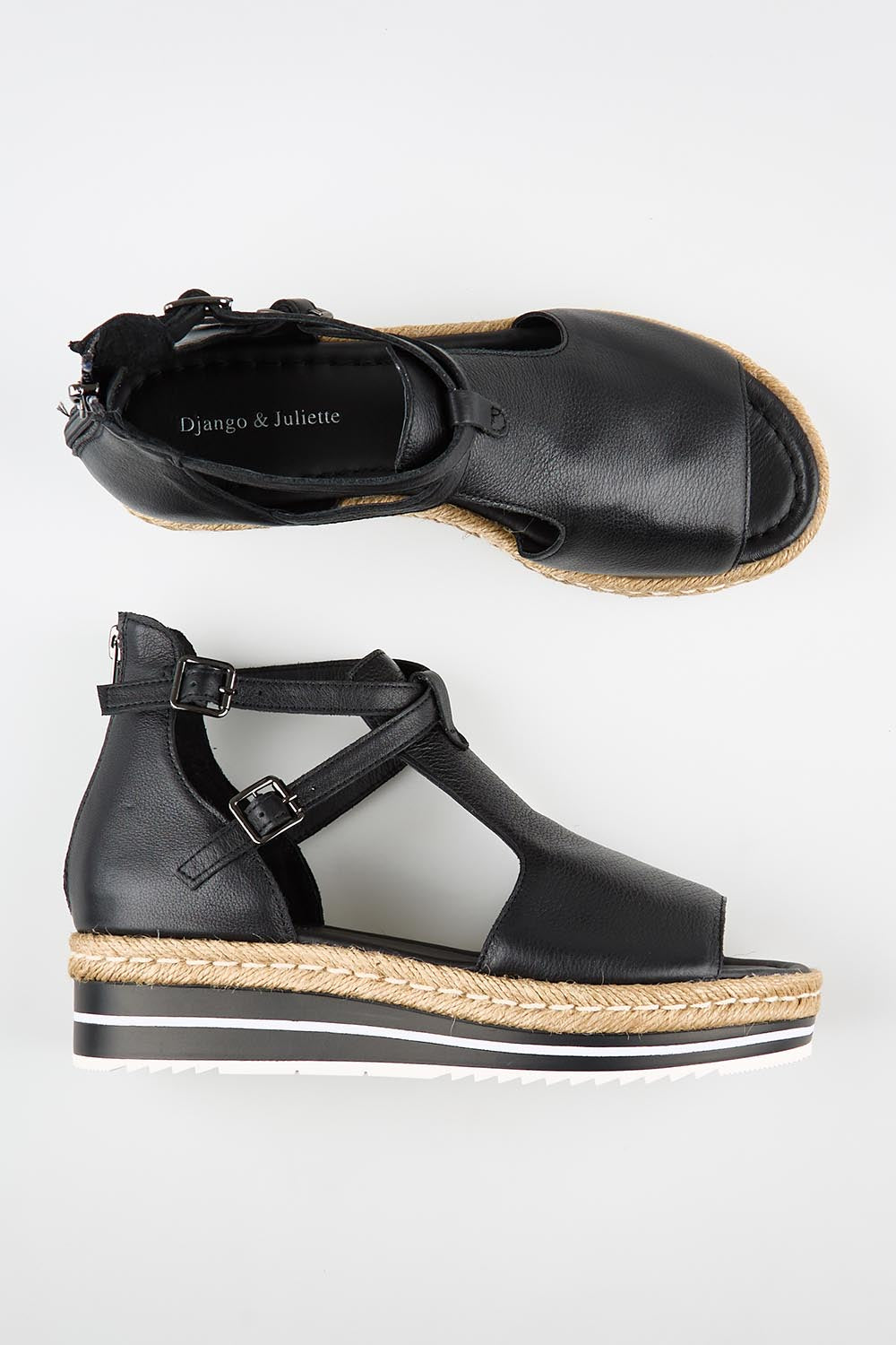 Model Genericm wearing size sample of the Alexys Leather Sandal - Black in colour Black, from an angle