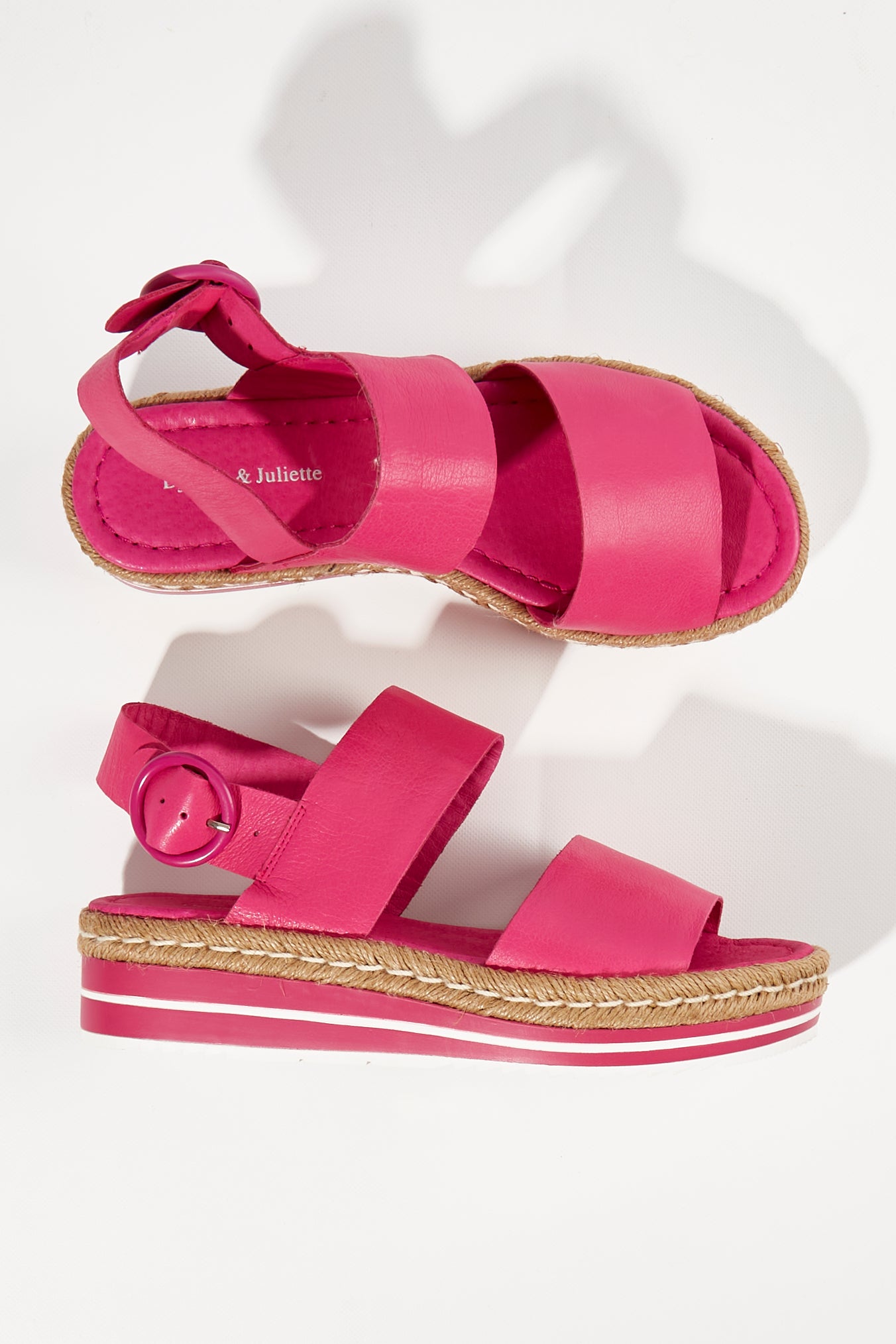 A model wearing size 38 of the Atha Sandal Flatform in colour Fuchsia (Pink), from the front, showing the whole outfit