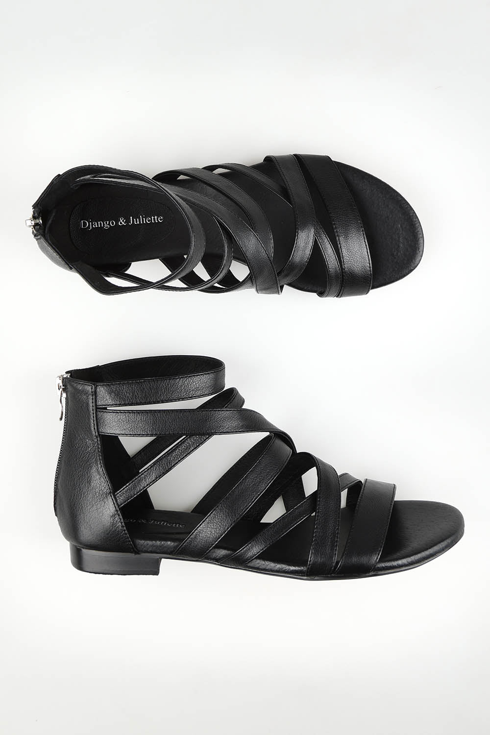 A model wearing size 37 of the Pillish Leather Flat Sandal in colour Black (Black), from the front, showing the whole outfit