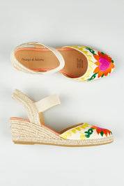 A model wearing size 37 of the Roda Embroidered Wedge in colour Bright, from the front, showing the whole outfit