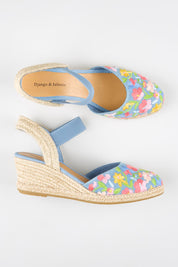 Model Genericm wearing size sample of the Rotem Embroidered Espadrille - Bluegelato in colour Bluegelato, from an angle