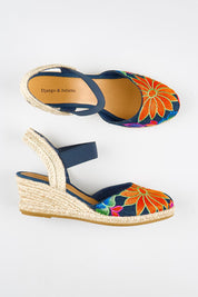 Model Genericm wearing size sample of the Ruta Embroidered Espadrille - Denimbright in colour Denimbright, from an angle