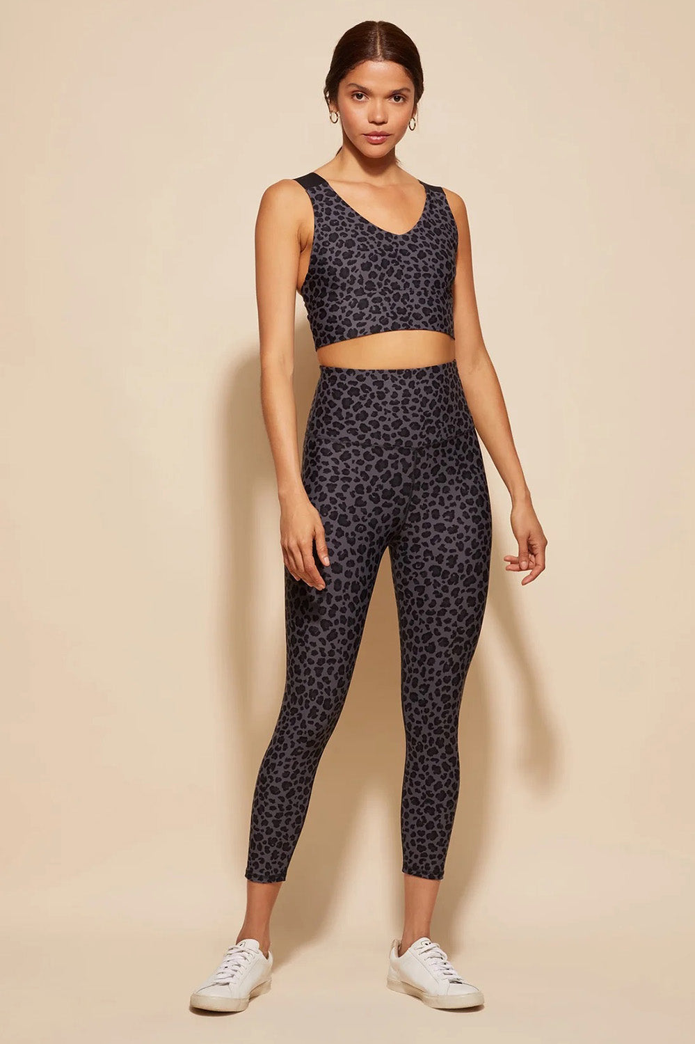 A model wearing the Antidote Crop in colour Leopardsmk (Grey), from the front, showing the whole outfit