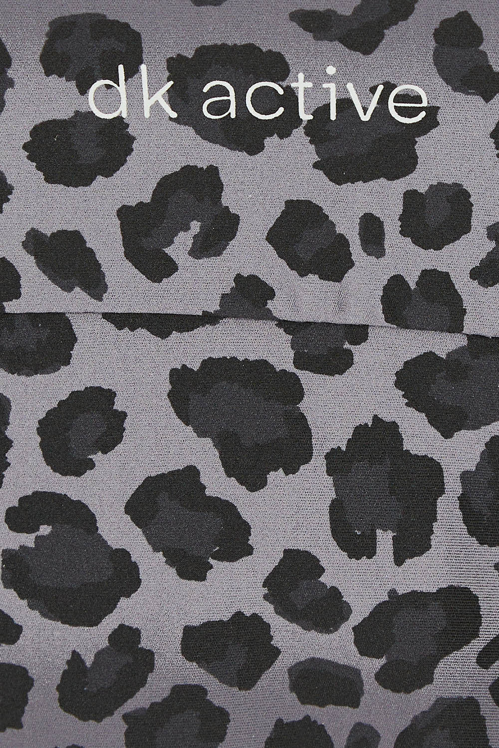 Product shot of the Antidote Crop in colour Leopardsmk (Grey), detail