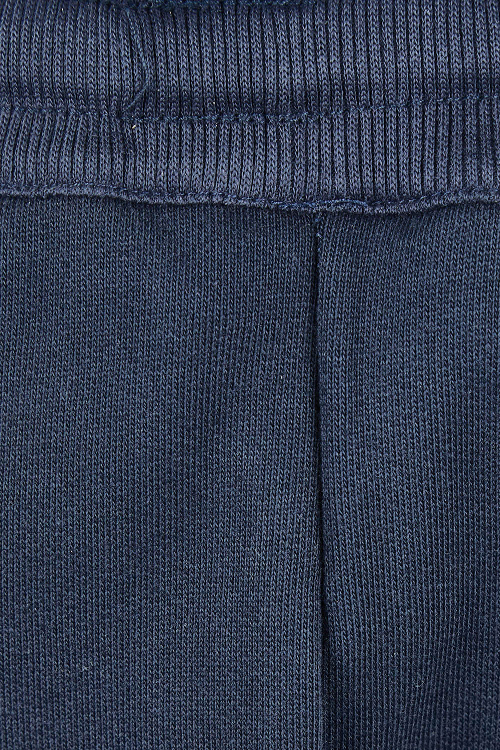 Product shot of the Nova Pant in colour Navy (Blue), detail