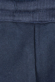 Product shot of the Nova Pant in colour Navy (Blue), detail