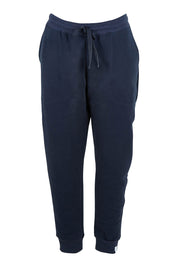 Product shot of the Nova Pant in colour Navy (Blue), from the front