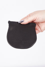 A model wearing size OneSize of the Lilly Leather Coin Purse in colour Black (Black), from the front, showing the whole outfit