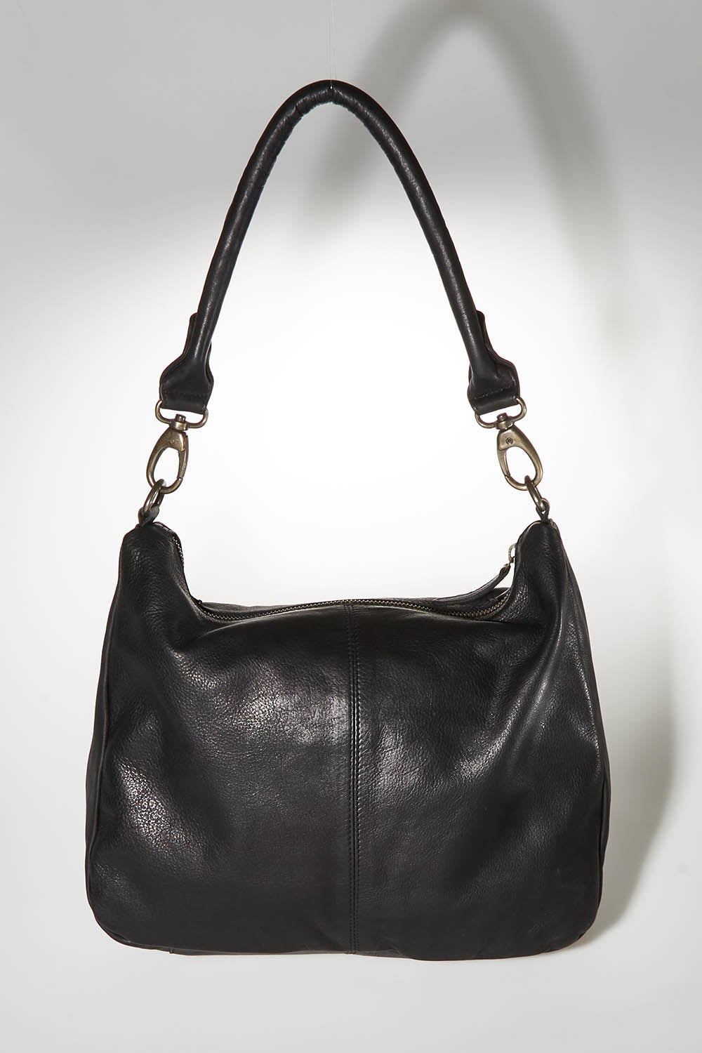 A model wearing size OneSize of the Poppy Leather Bag in colour Black (Black), from the front, showing the whole outfit