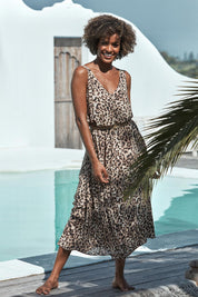 A model wearing the Savannah Maxi in colour Cheetah, from the front, showing the whole outfit