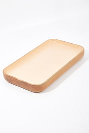 A model wearing size OneSize of the Savannah Platter in colour Peach, from the front, showing the whole outfit