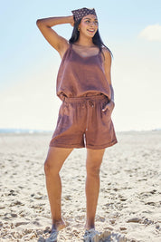 Model Eshan wearing size 10 of the Studio Linen Short – Chocolate in colour Chocolate, from the front