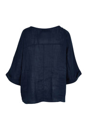 Product shot of the Studio Relaxed Top in colour Navy (Blue), from the back