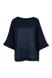 Product shot of the Studio Relaxed Top in colour Navy (Blue), from the front