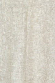 Product shot of the Studio Relaxed Top in colour Tusk, detail