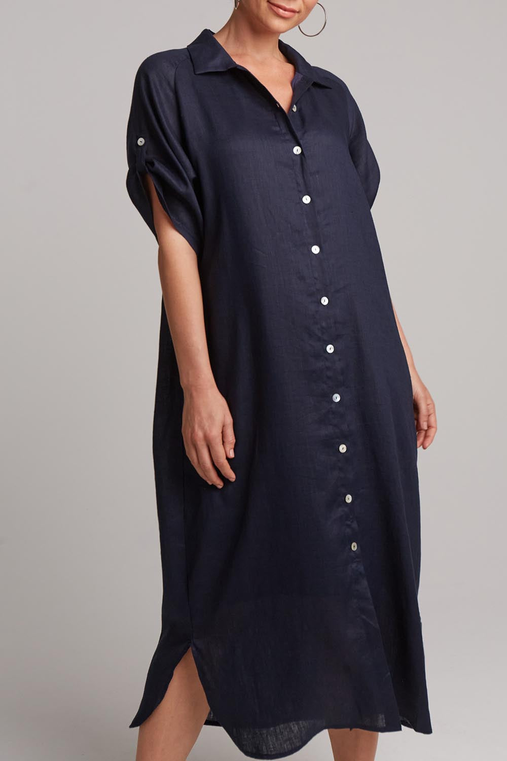 A model wearing the Studio Shirt Dress in colour Navy (Blue), from the front, cropped image