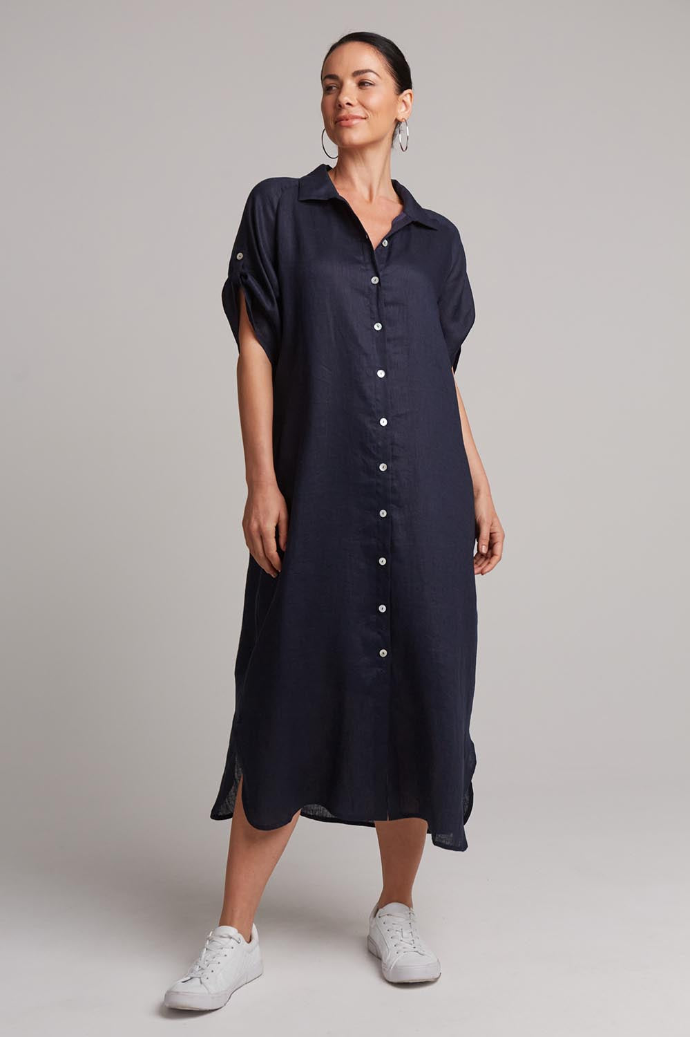 A model wearing the Studio Shirt Dress in colour Navy (Blue), from the front, showing the whole outfit
