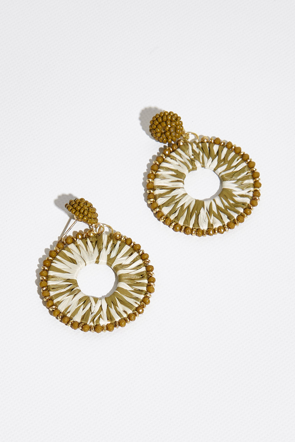 A model wearing size OneSize of the Soma Drop Earring in colour Cirque (Metallics), from the front, showing the whole outfit