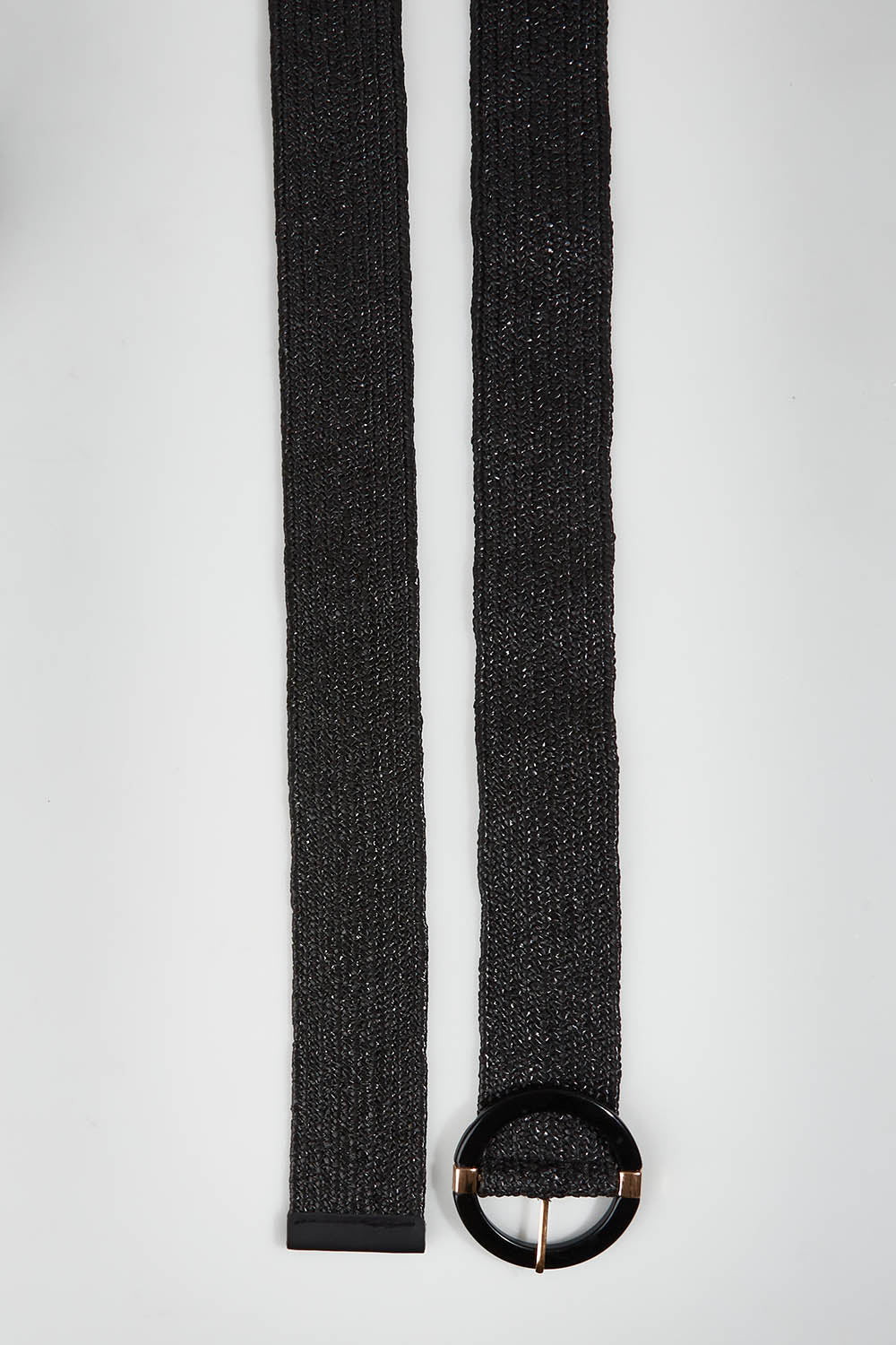A model wearing size OneSize of the Acacia Belt in colour Black (Black), from the front, showing the whole outfit