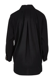 Product shot of the Studio Oversize Cotton Shirt in colour Ebony (Black), from the back